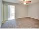 Bright bedroom featuring carpet flooring and natural light at 904 Sunbeam Dr, Lincolnton, NC 28092