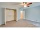 Bedroom featuring carpet flooring and a closet at 904 Sunbeam Dr, Lincolnton, NC 28092