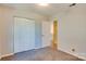 Neutral bedroom featuring a large closet and easy access to the kitchen at 904 Sunbeam Dr, Lincolnton, NC 28092