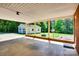 Covered outdoor space featuring a detached two car garage and a fire pit at 904 Sunbeam Dr, Lincolnton, NC 28092
