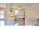Cozy kitchen with white appliances and a breakfast bar at 904 Sunbeam Dr, Lincolnton, NC 28092