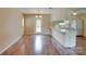 Bright kitchen area with wood floors and white countertops and appliances at 904 Sunbeam Dr, Lincolnton, NC 28092