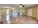 Open concept living space with hardwood floors connecting living area and kitchen at 904 Sunbeam Dr, Lincolnton, NC 28092