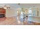 Open concept living area with a fireplace, kitchen, and hardwood floors at 904 Sunbeam Dr, Lincolnton, NC 28092