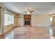 Spacious living room with a brick fireplace and hardwood floors at 904 Sunbeam Dr, Lincolnton, NC 28092