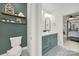 Stylish bathroom featuring a double vanity and easy access to a bedroom at 908 Gardenia St, Fort Mill, SC 29708