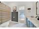 Well-lit bathroom showcasing a decorative shower curtain and vanity with black hardware at 908 Gardenia St, Fort Mill, SC 29708