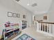 Bright hallway with playroom and decorative accents at 908 Gardenia St, Fort Mill, SC 29708