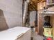 Functional basement featuring a freezer, shelving, and storage containers, ideal for organization at 1022 Kenilworth Nw Ct, Concord, NC 28027