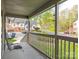 Relaxing porch view overlooking a quiet street and well-manicured lawns at 1022 Kenilworth Nw Ct, Concord, NC 28027
