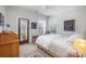 Bedroom featuring a door to a private balcony and multiple windows at 107 Iris Meadow Dr, Mooresville, NC 28115