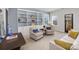 Bright living room features built-in bookshelves and comfortable seating area at 107 Iris Meadow Dr, Mooresville, NC 28115
