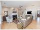Spacious living room featuring a fireplace, modern decor, and an open layout at 107 Iris Meadow Dr, Mooresville, NC 28115
