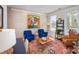 Cozy office space with comfortable seating, natural light, and stylish decor at 107 Iris Meadow Dr, Mooresville, NC 28115