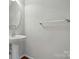 Bathroom featuring pedestal sink, large mirror, and modern fixtures at 125 Snead Rd # 60, Fort Mill, SC 29715