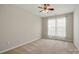 Carpeted bedroom with neutral paint, a fan, and lots of natural light at 125 Snead Rd # 60, Fort Mill, SC 29715