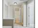 Bright hallway with multiple doorways and neutral carpet, plus overhead lighting at 125 Snead Rd # 60, Fort Mill, SC 29715