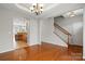 Open floor plan features hardwood floors connecting the dining area and modern kitchen at 125 Snead Rd # 60, Fort Mill, SC 29715