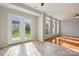 The living room boasts hardwood floors that connect to the adjacent tiled dining area at 125 Snead Rd # 60, Fort Mill, SC 29715