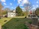 Well-maintained backyard featuring a shed and patio, ideal for storage and outdoor enjoyment at 13510 Brandon Trail Dr, Charlotte, NC 28213