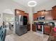 Well-equipped kitchen with stainless steel appliances, stylish cabinets, and ample counter space at 13510 Brandon Trail Dr, Charlotte, NC 28213