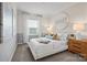 Bright bedroom with a comfy bed, plush pillows, modern decor, and ample natural light at 13709 Roderick Dr # 193, Huntersville, NC 28078