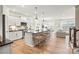 Bright kitchen with island, stainless appliances, pendant lights, and an open layout to the living spaces at 13709 Roderick Dr # 193, Huntersville, NC 28078
