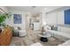 Relaxing living room with comfortable seating, soft carpet, and stylish neutral decor at 13709 Roderick Dr # 193, Huntersville, NC 28078