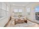 Bright living room with natural light, a comfortable sofa, area rug and stylish coffee table at 13709 Roderick Dr # 193, Huntersville, NC 28078
