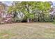Expansive backyard featuring a large, open grassy area and large trees at 140 Mickle Ct, Rock Hill, SC 29732