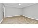 Bedroom featuring grey walls, wood floors, ceiling fan, and neutral decor at 140 Mickle Ct, Rock Hill, SC 29732