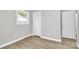 Bright bedroom with light-toned wood flooring, closet, and window at 140 Mickle Ct, Rock Hill, SC 29732