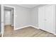 Neutral bedroom with light-toned wood flooring and closet space at 140 Mickle Ct, Rock Hill, SC 29732