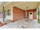 Carport featuring brick walls, white trim, and a covered area with a concrete floor at 140 Mickle Ct, Rock Hill, SC 29732