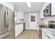 Modern kitchen showcasing stainless steel appliances, white cabinets, and granite countertops at 140 Mickle Ct, Rock Hill, SC 29732