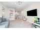 Bright playroom with toy market, comfortable seating, and a view to the stairs at 15230 Ravenall Dr, Huntersville, NC 28078