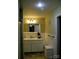 Well-lit bathroom featuring vanity, modern fixtures, and a shower, providing a clean and functional space at 154 Tiger Oak Ln, Rockwell, NC 28138