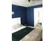 Comfortable bedroom featuring stylish decor and an en suite bathroom, creating a relaxing private space at 154 Tiger Oak Ln, Rockwell, NC 28138
