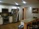 Functional kitchen featuring stainless steel appliances, granite countertops, and hardwood flooring at 154 Tiger Oak Ln, Rockwell, NC 28138