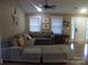 Spacious living room with natural light, comfortable seating, and a welcoming atmosphere, perfect for entertaining at 154 Tiger Oak Ln, Rockwell, NC 28138