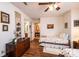 Inviting bedroom featuring hardwood floors, providing access to an adjacent bathroom and hallway at 1713 12Th Ne St, Hickory, NC 28601