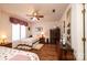 Comfortable bedroom with hardwood floors and a ceiling fan at 1713 12Th Ne St, Hickory, NC 28601