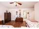 Cozy bedroom featuring hardwood floors, and convenient access to an adjacent bathroom at 1713 12Th Ne St, Hickory, NC 28601