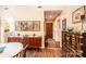 Dining area with hardwood floors, decorative furnishings and easy access to front door at 1713 12Th Ne St, Hickory, NC 28601
