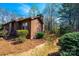 Side view of the house featuring wood siding and a charming outdoor deck at 1713 12Th Ne St, Hickory, NC 28601