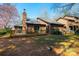 Home's exterior showing a wooden deck and a well-maintained yard at 1713 12Th Ne St, Hickory, NC 28601