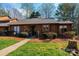 A charming home front featuring a well-maintained lawn and classic exterior at 1713 12Th Ne St, Hickory, NC 28601