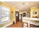 Eat-in kitchen with stainless appliances and bar seating at the kitchen island at 1713 12Th Ne St, Hickory, NC 28601
