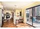Kitchen with eat-in island, stainless appliances, and access to outdoor deck at 1713 12Th Ne St, Hickory, NC 28601