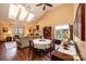 Bright open living area with skylights, hardwood floors, fireplace and adjacent dining area with comfortable seating at 1713 12Th Ne St, Hickory, NC 28601